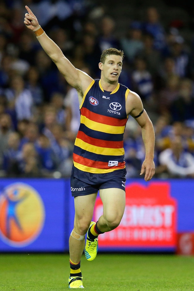 AFL 2016 Rd 01 - North Melbourne v Adelaide MELBOURNE, AUSTRALIA - MARCH 26: Josh Jenkins of the Crows celebrates a goal during the 2016 AFL Round 01 match between the North Melbourne Kangaroos and the Adelaide Crows at Etihad Stadium, Melbourne on March 26, 2016. (Photo by Darrian Traynor/AFL Media)